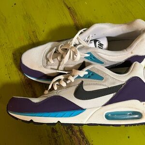 Nike size 11. Purple, white and blue.